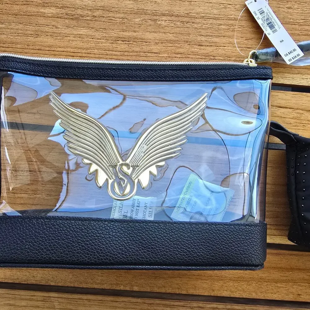 NWT Victoria's Secret Fashion Show Cosmetic Case set of 2 bags.